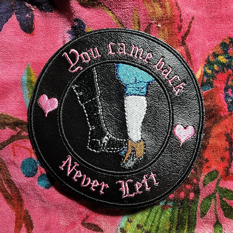 Never Left Boot Touch Embroidered Iron On Patch Black Vinyl Pink Text
